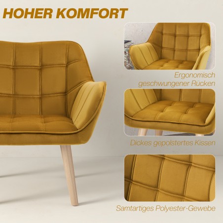 Kollane polsterdatud tugitool, sametise välimuse ja kummipuidust jalgadega