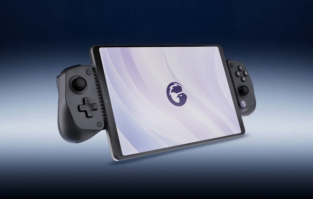 Portable console with large touchscreen and two attachable controllers on the sides, visible against a gradient background