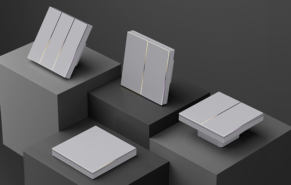 Four white smart switches of different sizes arranged on multi-level gray platforms