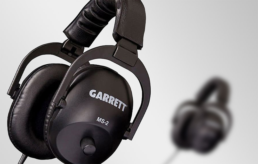 Garrett headphones in the foreground with a blurred background showing a second pair.