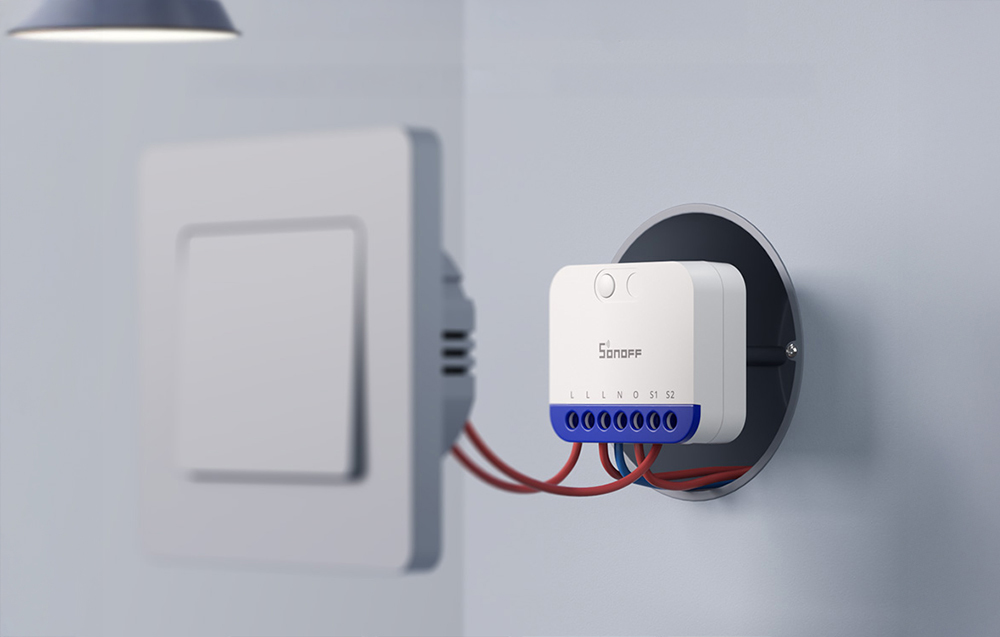 MINI-DIM mounted in a flush-mounted box behind a wall switch