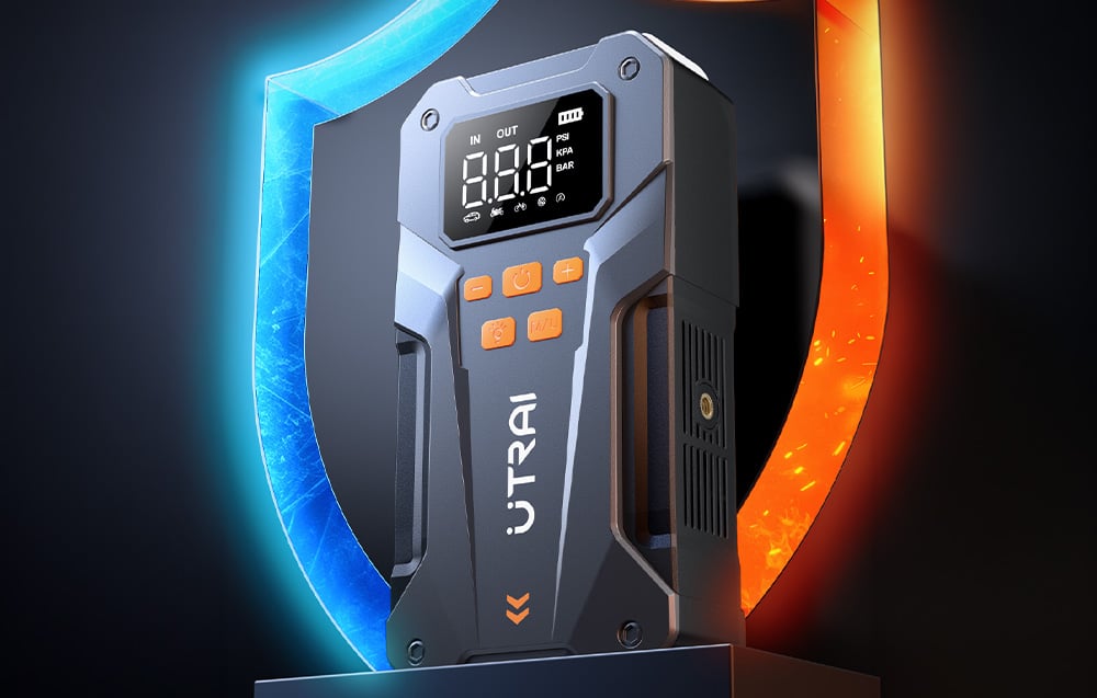 A car starter with a visible screen and buttons against a blue-and-orange dial.