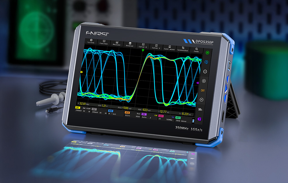 Benchtop digital oscilloscope with blue waveforms displayed.