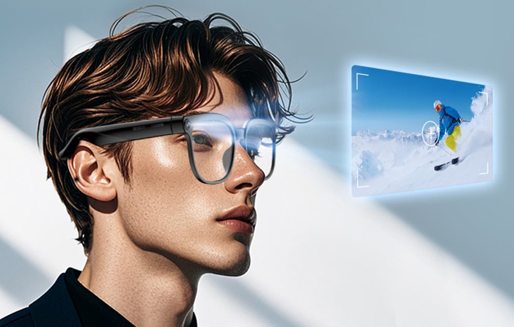 A man looking straight ahead, seeing a virtual screen through his glasses showing a skier on a mountain slope.