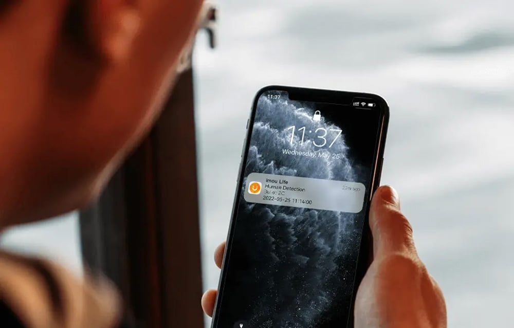 Smartphone with a notification: Imou Life, Human Detection, Bullet 2C, 2022-05-25 11:14:00