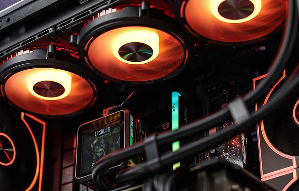 Computer interior with three illuminated fans