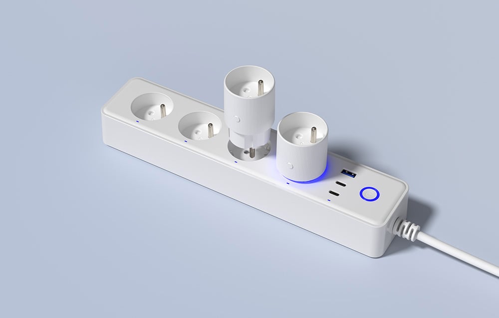 Two smart plugs connected to a power strip with USB ports.