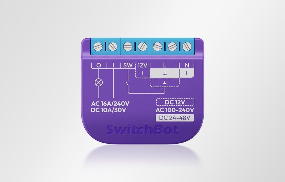 Front view of the purple SwitchBot with the connections described: AC 16A/240V, DC 10A/30V and DC 12V