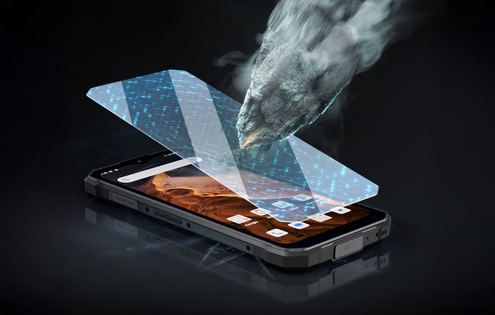 Phone and tempered glass with a rock falling on them