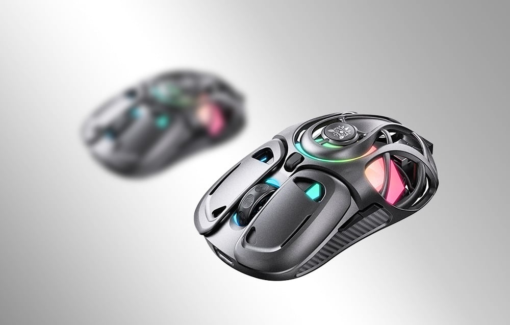 Two black gaming mice with backlight and holes on gray background