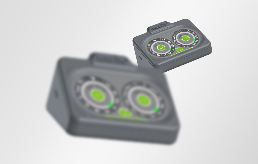 A composition of two RainPoint® controllers on a gray background, where the smaller controller at the top is sharp, and the large one in the foreground is heavi