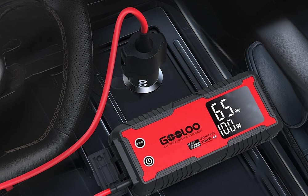 Car starter connected to a car cigarette lighter socket with a 65% display
