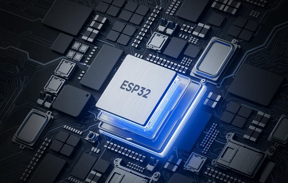 ESP32 chip mounted on a PCB with blue backlighting, surrounded by other electronic components