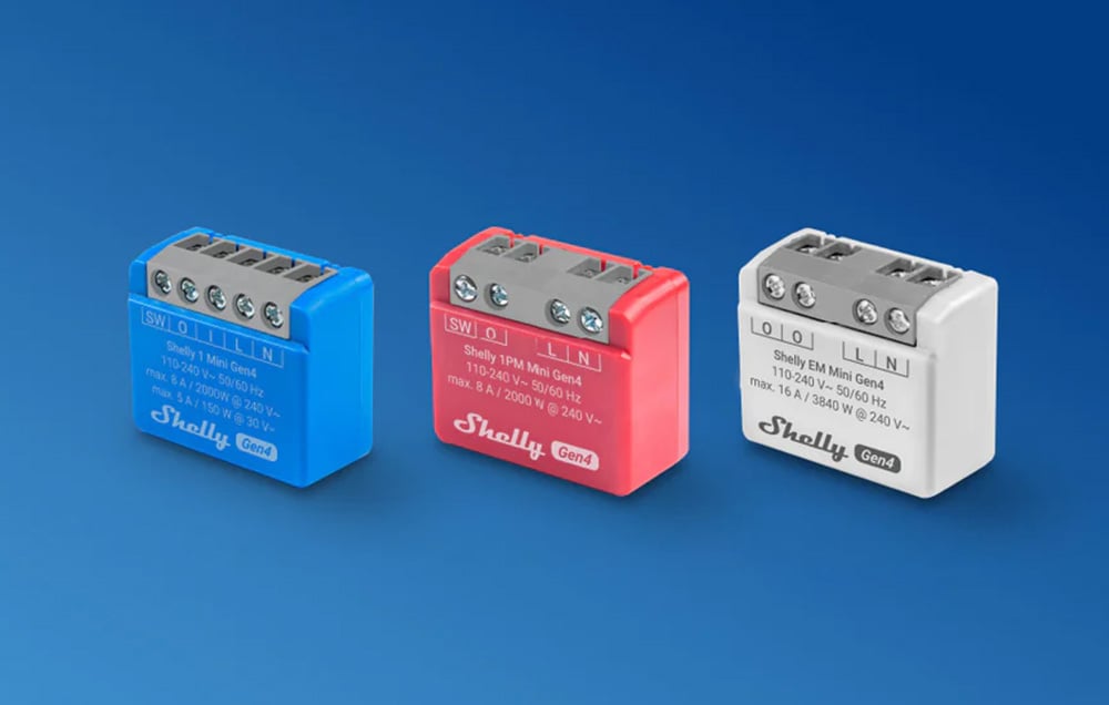 4 Shelly energy meters on blue background