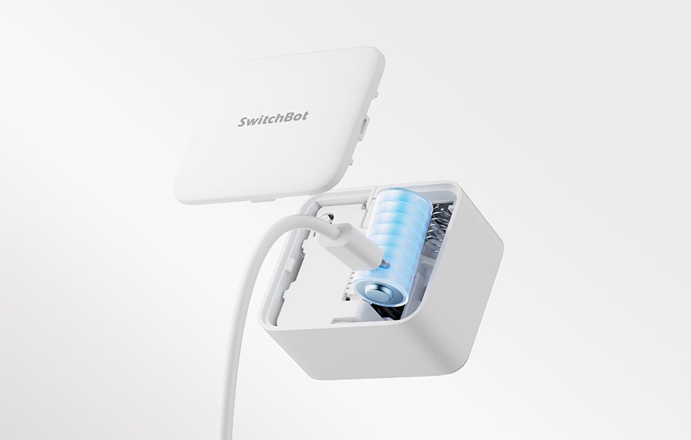 A photo collage showing the SwitchBot switch in use: on a light switch, a coffee maker, a fan, and a computer.