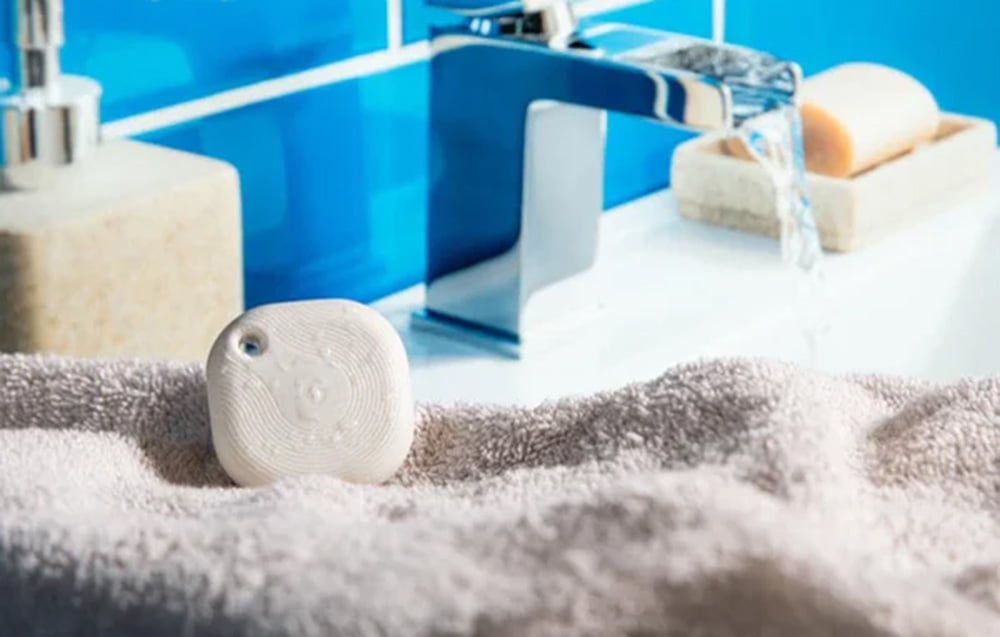 Scene activation button located on a towel on the sink where water is poured