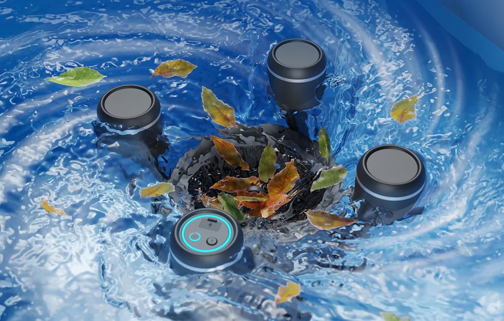 The swimming robot floats on the water’s surface, surrounded by swirling leaves being sucked into its central filter basket