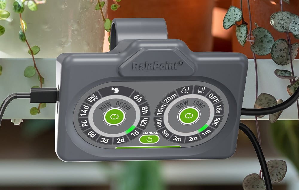 Close-up of the RainPoint® controller panel with two green-backlit touch knobs