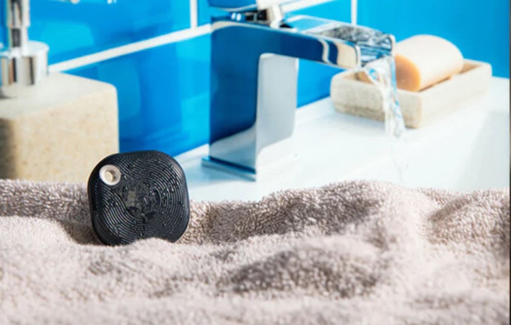 Scene activation button on a towel next to the sink where water is poured