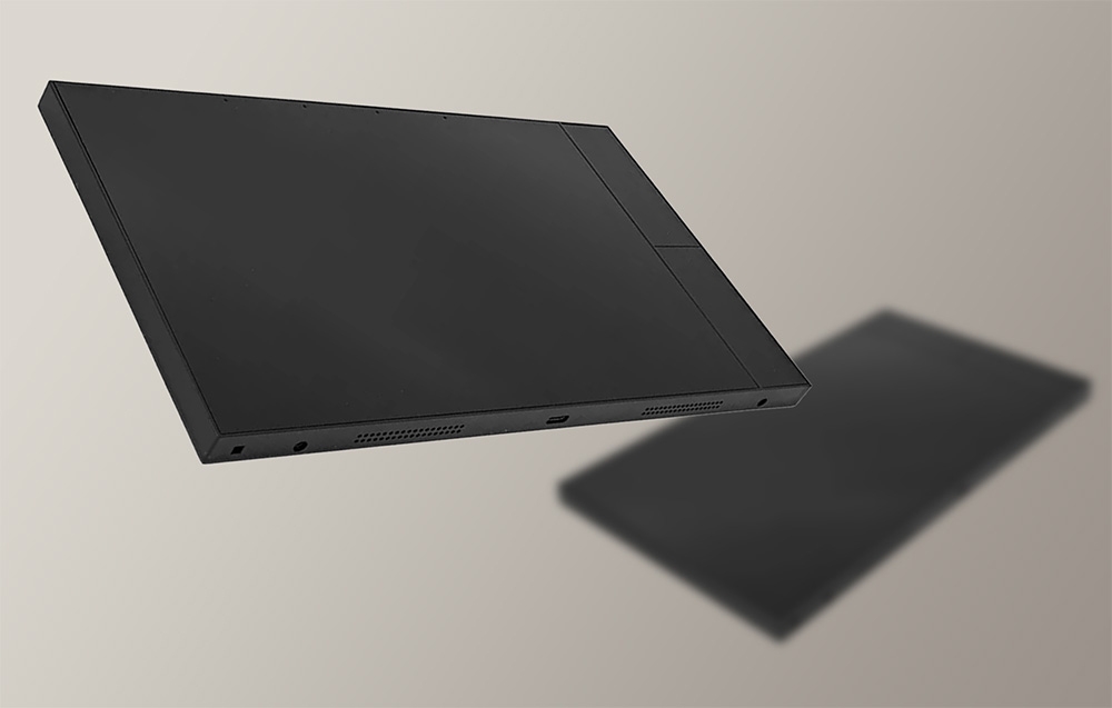 Two black touch panels with screens off on a beige background