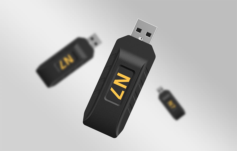 Three black N7 adapters on a gray background