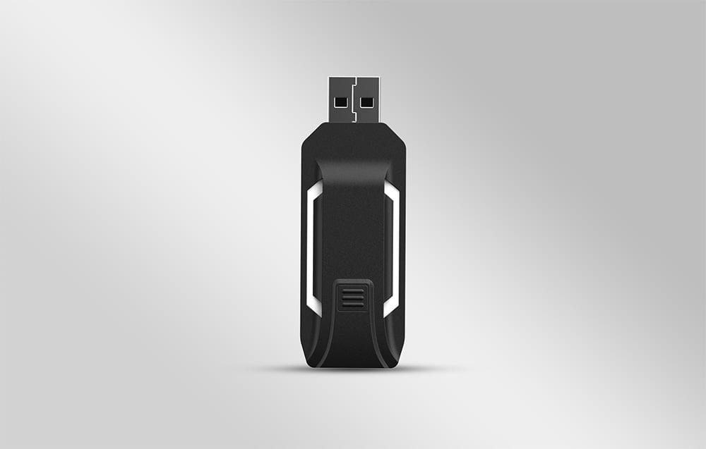 Rear view of a black USB adapter on a gray background