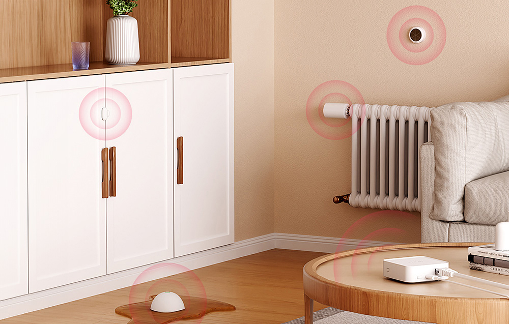 Room with several smart sensors placed on furniture, radiator, wall and floor