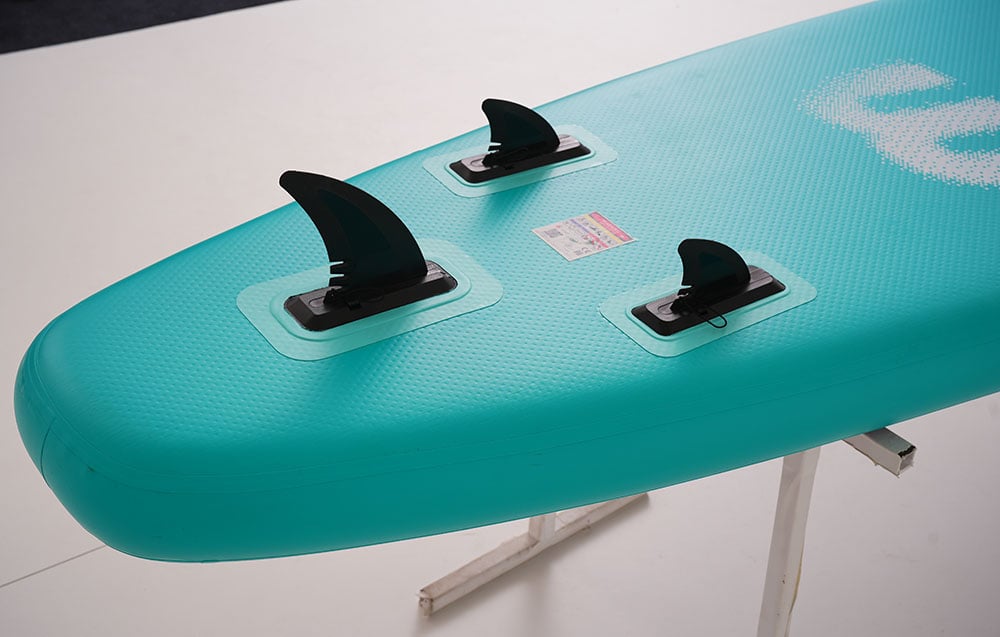 Close-up of the fins of the blue swimming board