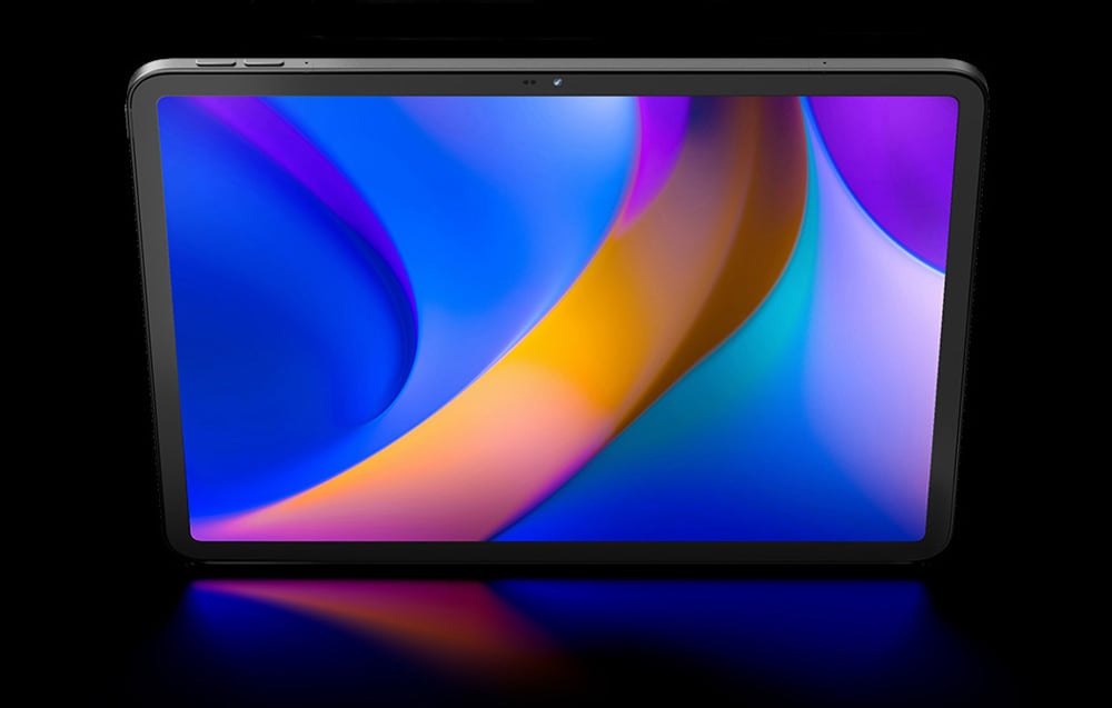 Tablet with colorful abstract wallpaper in shades of blue, orange and purple with reflection