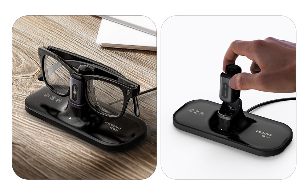 Close-up of smart glasses charging on the BOBOVR CG2 magnetic docking station and the detachable battery clip.