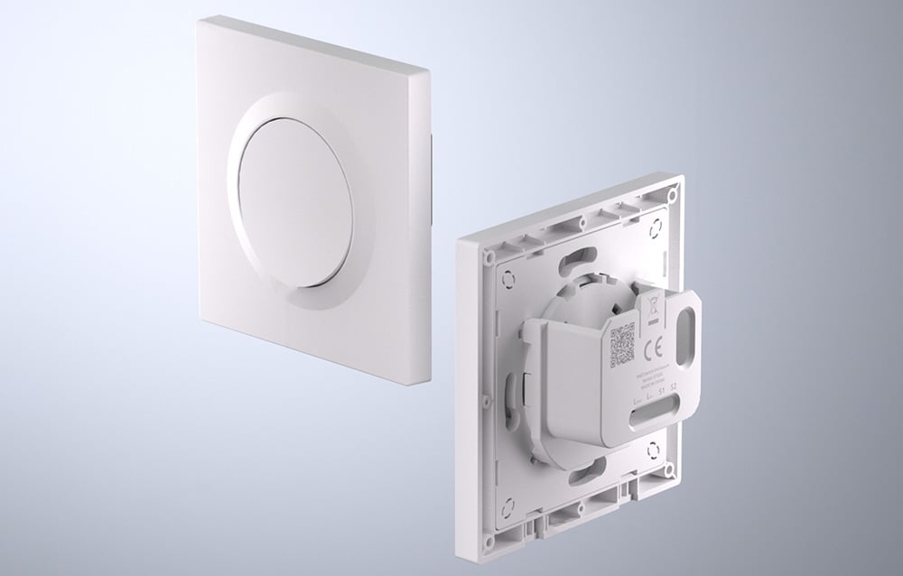 2 white wall switch housing on light background.