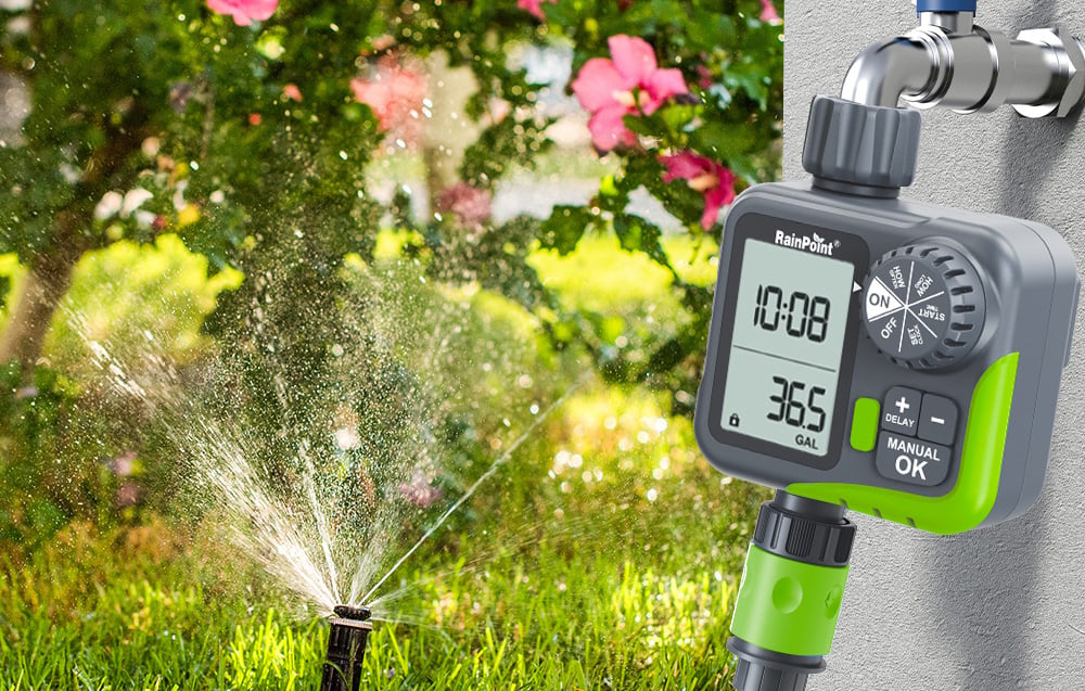 RainPoint electronic controller with a large LCD display controlling a sprinkler in a sunny garden