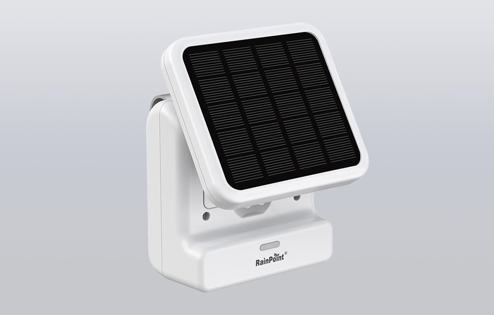 Close-up of a white RainPoint solar panel against a gray studio background