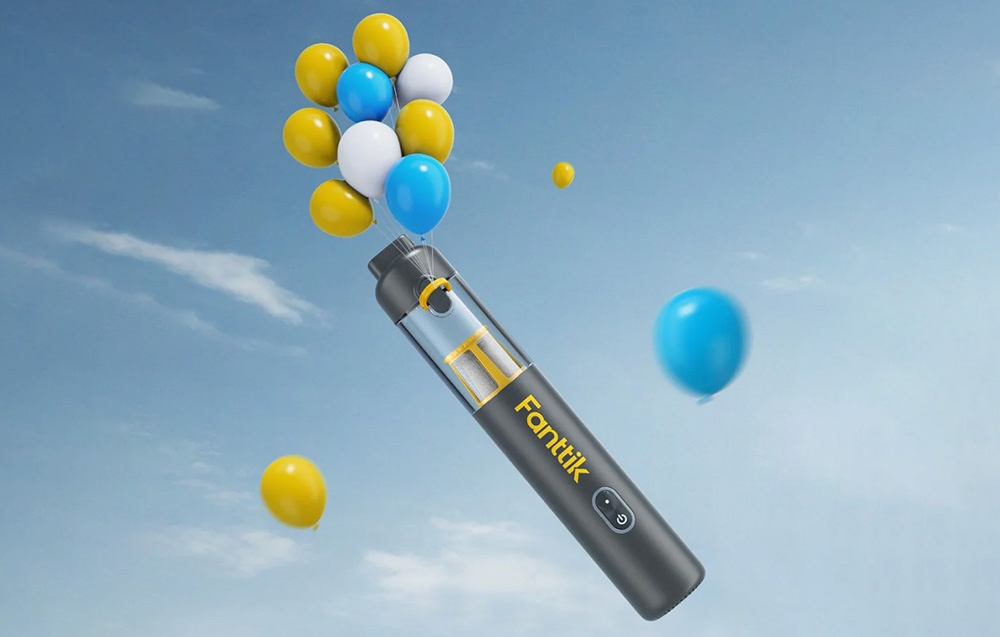Fanttik wireless car vacuum cleaner against a background of colorful balloons and blue sky.