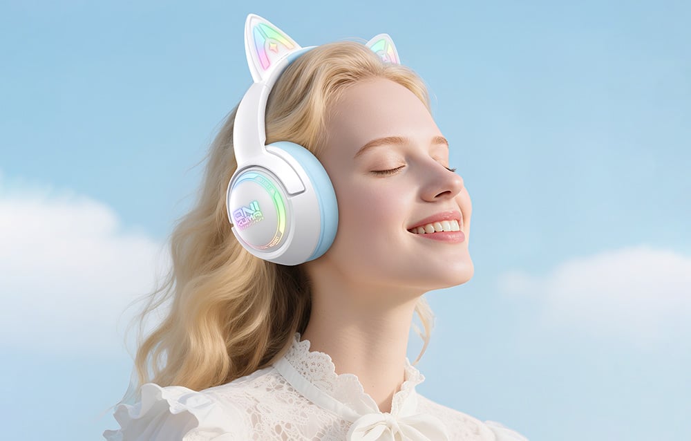 Smiling woman in white elegant shirt wears Onikuma headphones, clouds can be seen in the background