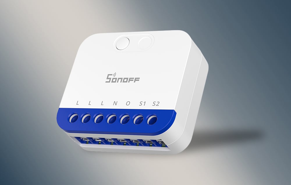 Close-up of the Sonoff MINI-DIM smart dimmer on a light background