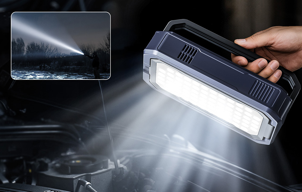 A car starter is used as a powerful flashlight to illuminate the engine under the hood.