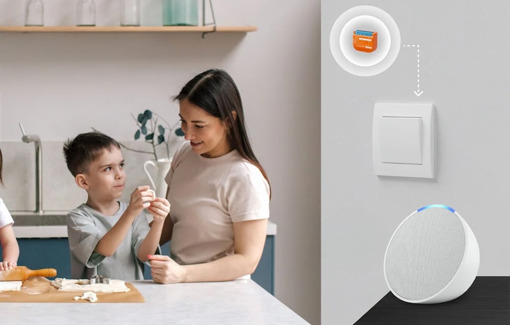 Woman and child cooking in the kitchen, on the right SwitchBot wiring diagram behind the light switch