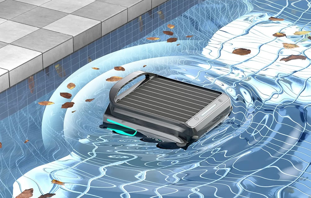 Wybot F1 robot collecting debris at the edge of the pool