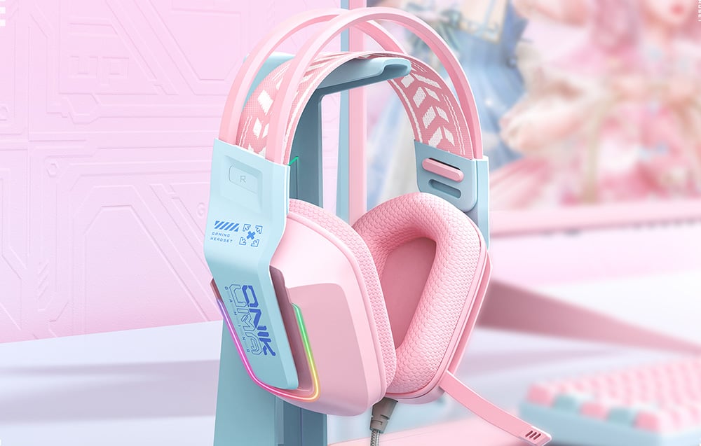Pink gaming headphones hanging on a bracket