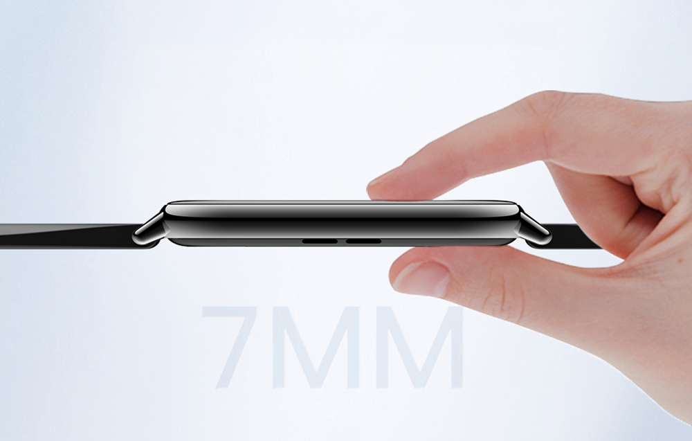 A hand holding the case of a black smartwatch, with the text “7 MM” in the background