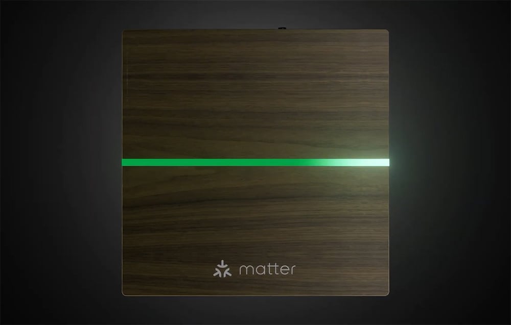 Top view of Matter device with wooden finish and green horizontal light bar in the middle