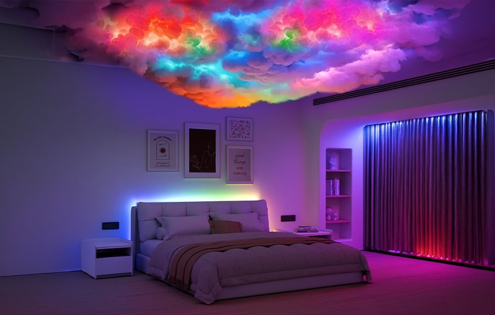 Bedroom with a large bed and nightstands, room lit by colored LED strip