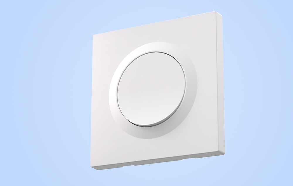 White switch housing on a blue background.