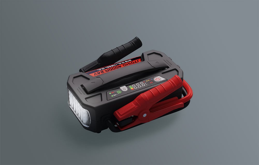 The starter unit shown at an angle, featuring a robust housing with a handle and control panel.