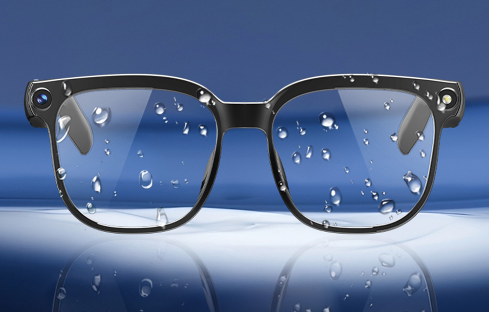 Modern black glasses with water droplets on the lenses, highlighting their splash resistance.