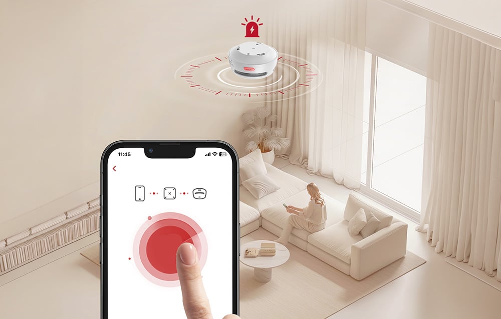 Smartphone screen with the app displaying an alarm from a ceiling-mounted detector in a bright living room