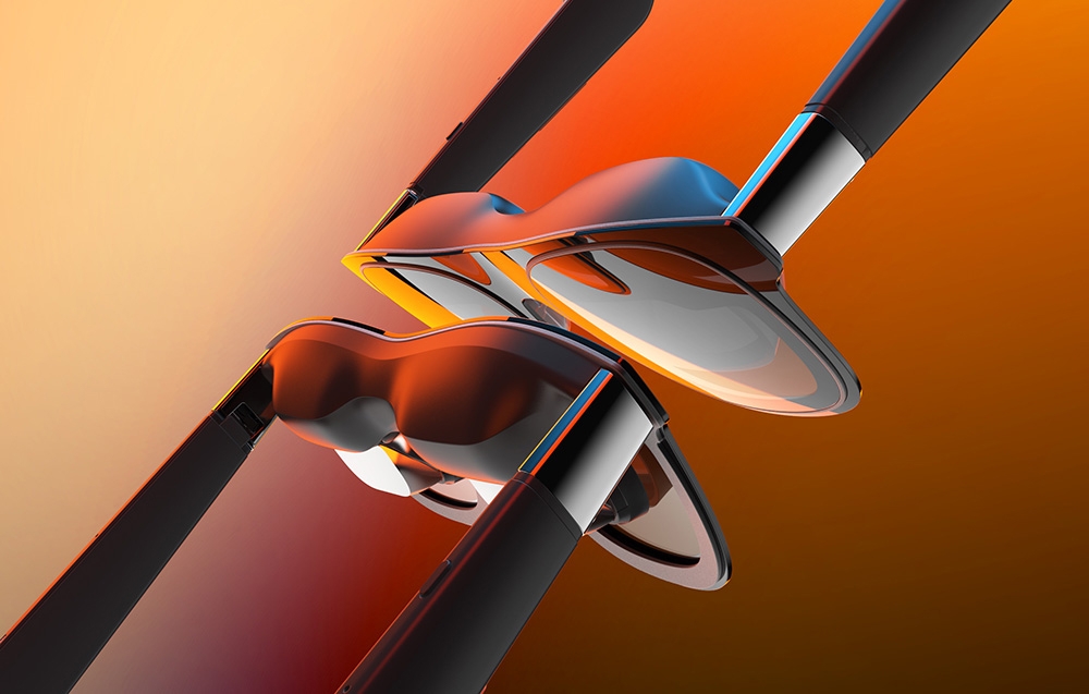two pairs of black AR glasses on a gradient black-orange background