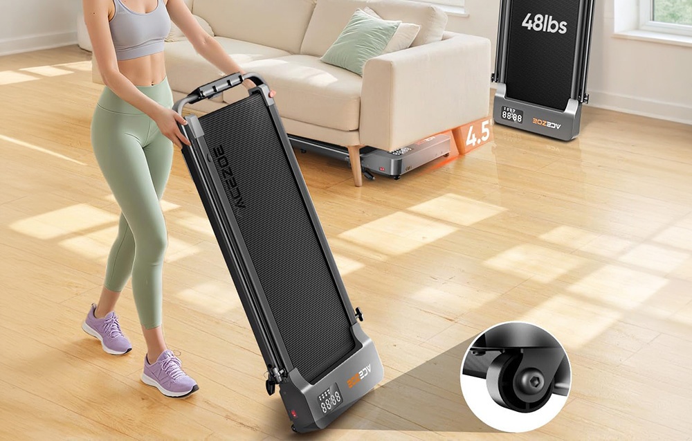 A woman in athletic wear carrying a folding treadmill in the living room