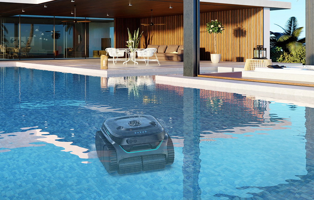 Black pool robot with turquoise accents cleaning the bottom of a luxury pool next to a modern villa with a wooden facade